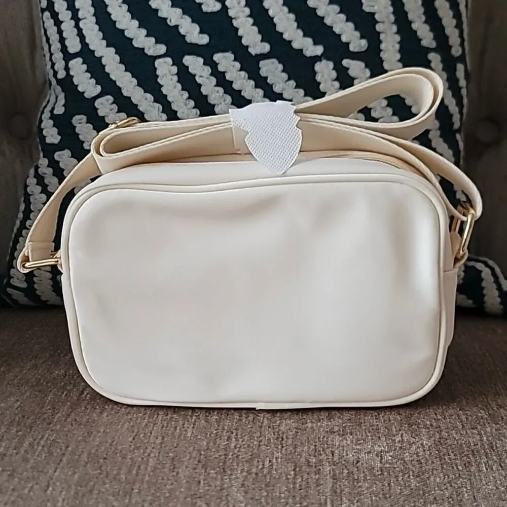 NWT Gorgeous Biossance White/ Ivory Satin Light Cushion adjustable crossbody bag